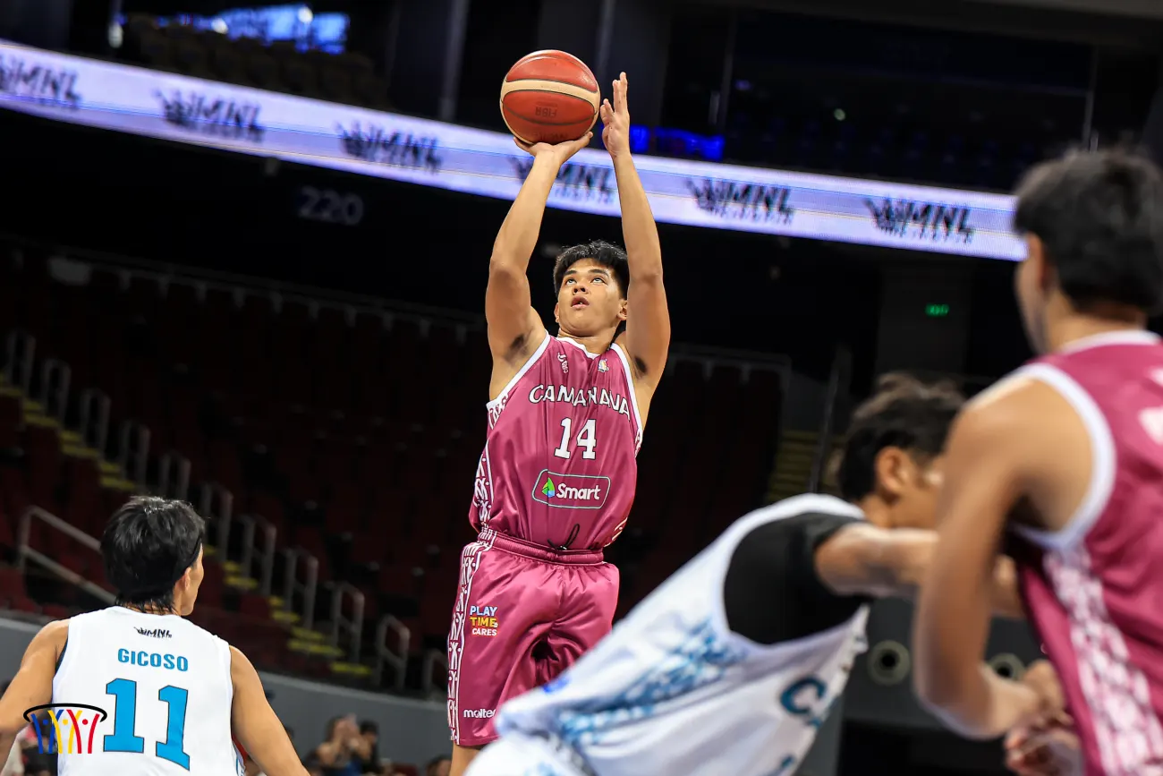 An EZ Boleros–CAMANAVA player rises for a jumper